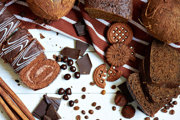 Many different chocolates and cookies
