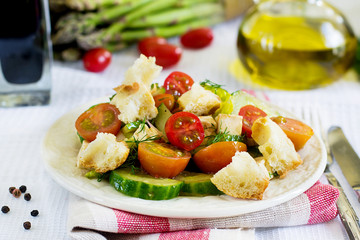 Salad with cucumbers, cherry tomatoes, feta cheese