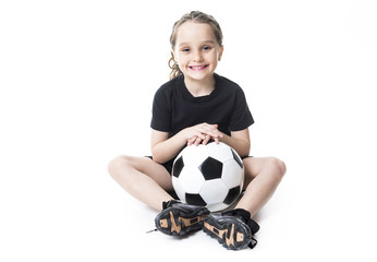 Young girl play soccer ball, Isolated over white