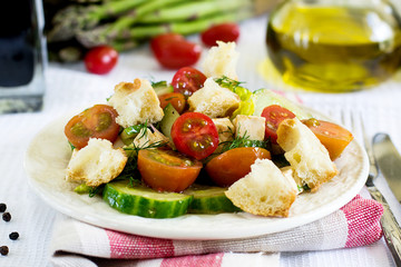 Salad with cucumbers, cherry tomatoes, feta cheese