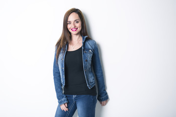 Obraz premium Body Shot of a Cheerful Woman in Denim jacket
