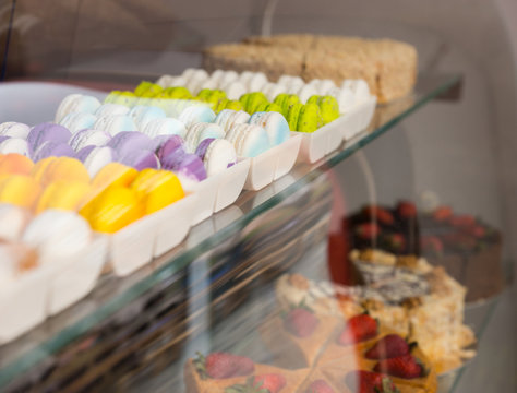 French macarons on display in a bakery