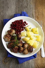Swedish meatballs with potatoes and berries