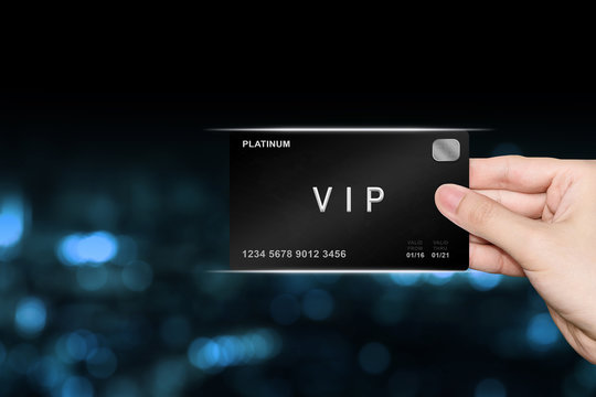 hand picking VIP or very important person platinum card