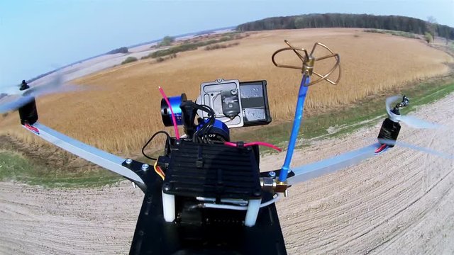 
Drone, copter  films  going motorcycle on  rural  road through camera with gimbal

