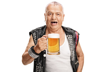 Mature punk rocker holding a pint of beer