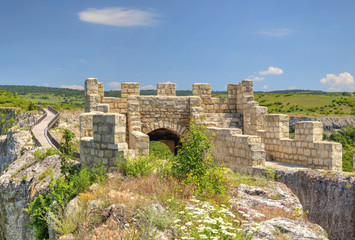 Fototapeta premium Stone walls and gate of ancient fortress