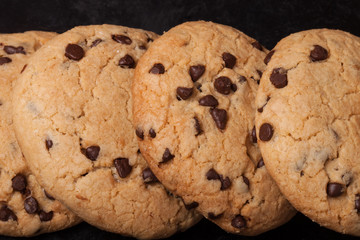 American cookies with chocolate drops on a black background