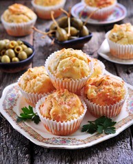 snack cakes with cheese, ham, olives and sun-dried tomatoes