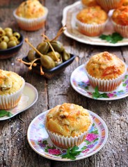 snack cakes with cheese, ham, olives and sun-dried tomatoes