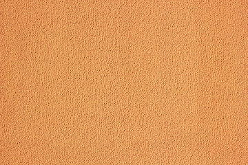 Plaster texture wall. Exterior orange stucco.