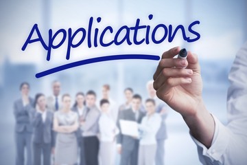 Composite image of mid section of businessman writing