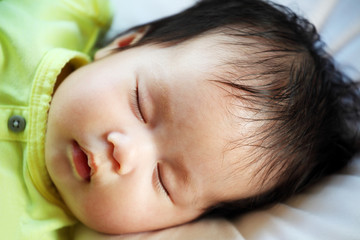 Obraz na płótnie Canvas Newborn Baby Peacefully Sleeping