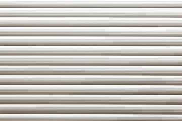 Roller shutter door. Striped textured white garage door background