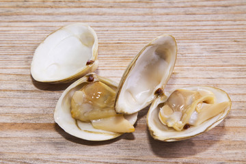 seafood, clams on wooden background