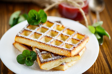 baked cheese waffles with powdered sugar