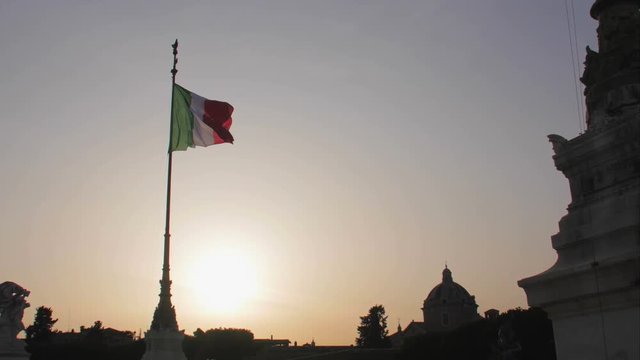 Italian flag in the sunset in Rome