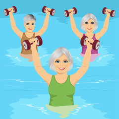 senior women making aqua gym exercises with dumbbells in swimming pool