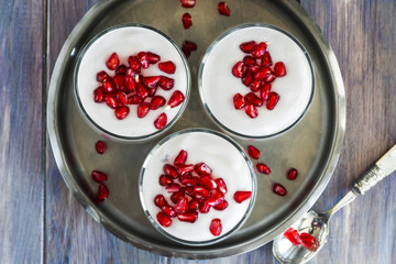 Mascarpone mousse dessert with pomegranate and honey - top view