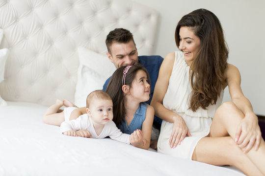 Family on the bed