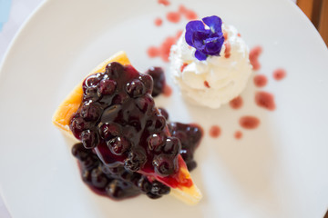 Blueberry cheesecake and cream.