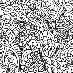 Seamless black and white pattern. Ethnic henna hand drawn background for coloring book, textile or wrapping.
