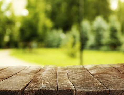 Beautiful spring or summer season abstract nature background with wooden floor
