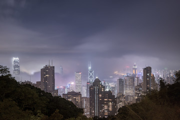 Fototapeta premium Urban fog View of Hong Kong from Victoria peak