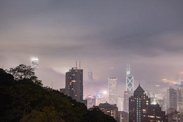 Fototapeta premium Urban fog View of Hong Kong from Victoria peak