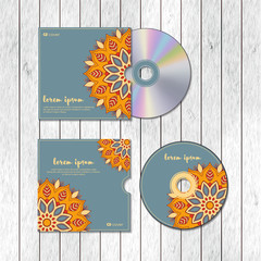 CD cover design template with floral mandala style on the wood texture background. Arabic, indian, pakistan, asian motif. Vector illustration under clipping mask.