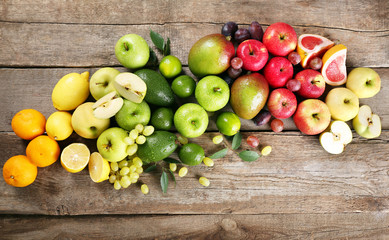 Fruits on wooden background