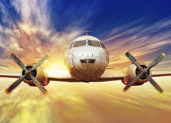 airplane in the sunset