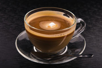 White cup of espresso coffee