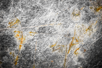 Grunge rusty scratched metal surface.