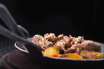 fried potatoes with meat veal