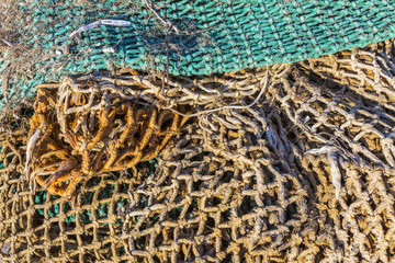 Details of an old fishing net fishing net in the port.