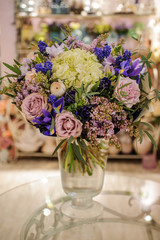 Bouquet with purple , blue and white different flowers