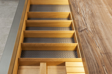 Closeup of open wooden drawer for cutlery