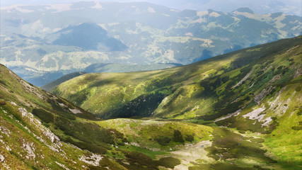 The slopes of the Carpathian Mountains. The landscape of green hills.