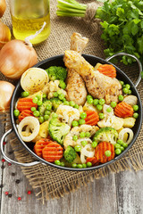 Grilled chicken legs with vegetables