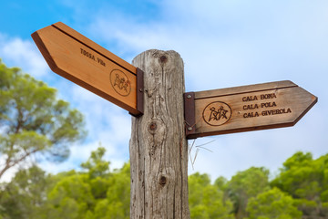 Signpost of hiking trails to Tossa de Mar, Cala Pola, Cala Bona and Cala Zhiverola, Costa Brava, Spain