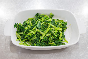 green boiled sliced bog choy vegetable