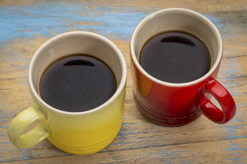 two cups of espresso coffee