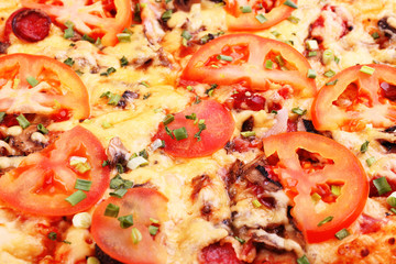 Delicious fresh pizza closeup