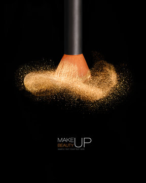 Makeup concept. Cosmetics brush with glowing face powder