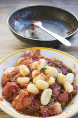  potato dumplings  with tomato sauce