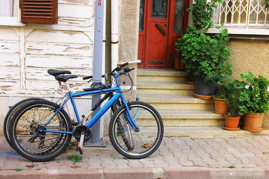 bike standing near the entry to the house