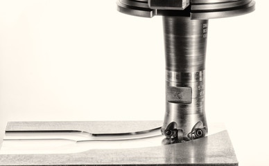 milling cutter work on a white background, monochrome version © jacomofl