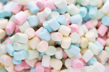 Background or texture of colorful mini marshmallows.
