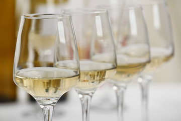 Glasses of white wine closeup